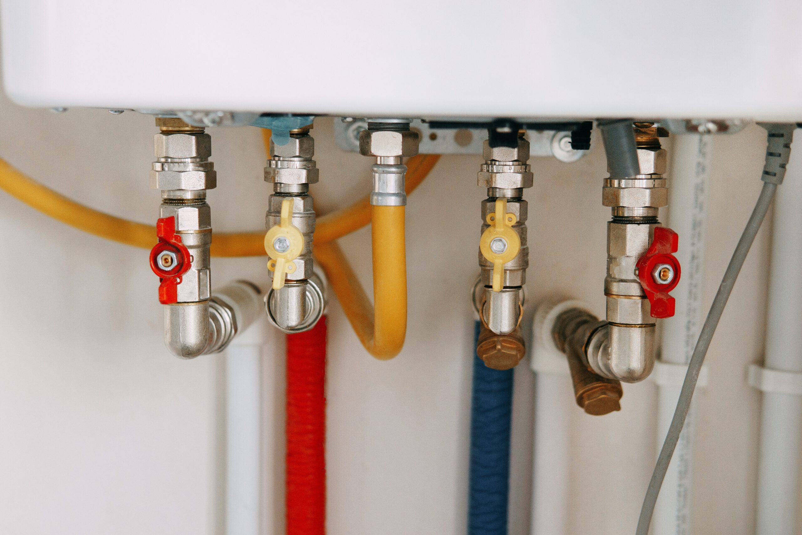 Close-up,View,Of,Water,Heater,Pipes,And,Valves,In,A